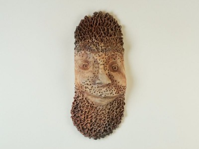 Pit-fired mask