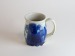 Salt-fired mugs copper and cobalt