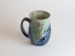 Salt-fired face mugs