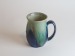 Salt-fired face mugs