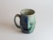 Salt-fired face mugs