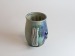 Salt-fired face mugs