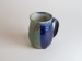 Salt-fired face mugs