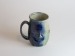 Salt-fired face mugs