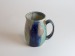 Salt-fired face mugs