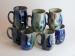 Salt-fired face mugs
